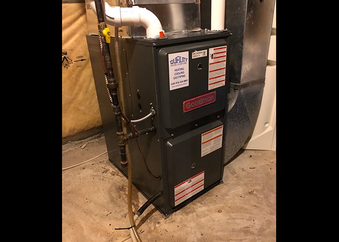 Residential furnace installation in a home mechanical room